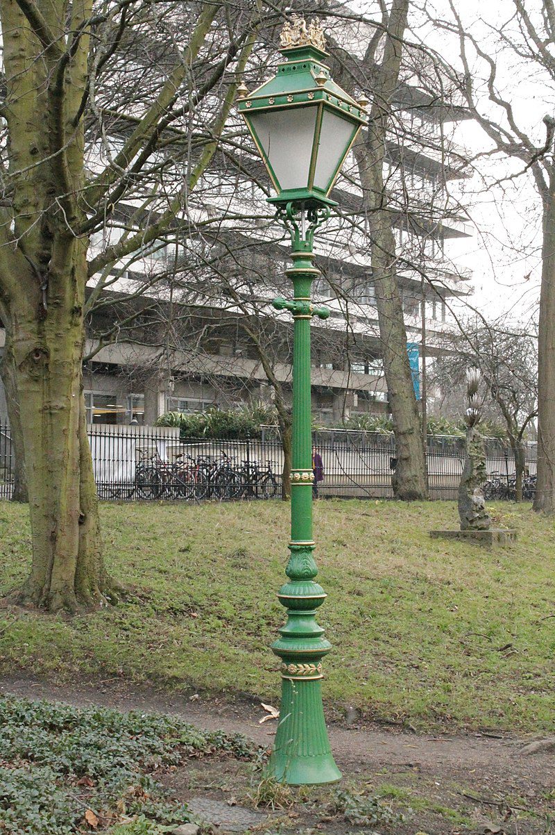 An old, historic street in Edinburgh with traditional stone buildings.